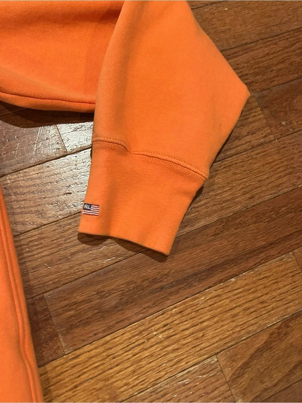 Polo Ralph Lauren full-zip hoodie with white text branding across the chest.